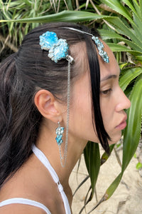 Bryon hair clip with his blue earring